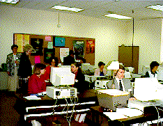  A picture of Liz Qunell and Chris Billinksky in the Davis computer lab.