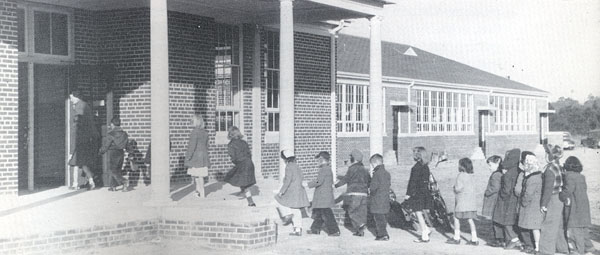 students entering new building