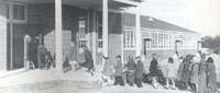 Students entering new building.